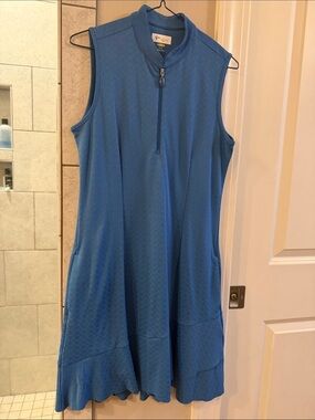 Golf dress by Greg Norman- Dry tech